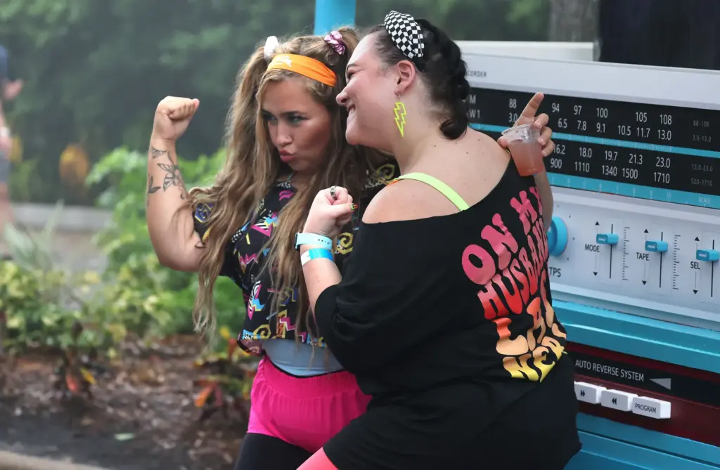 Attendees pose for photos during Scream & Sweat, an exclusive...