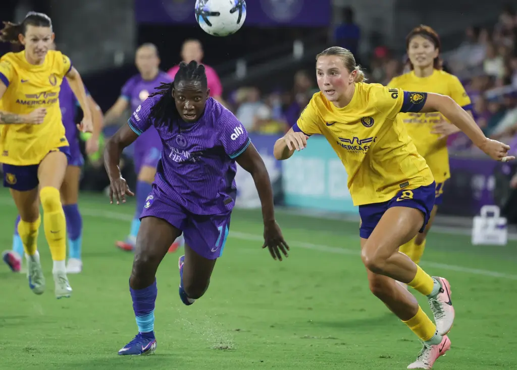 Orlando player Barbra Banda (11) and Utah player Kate Del...