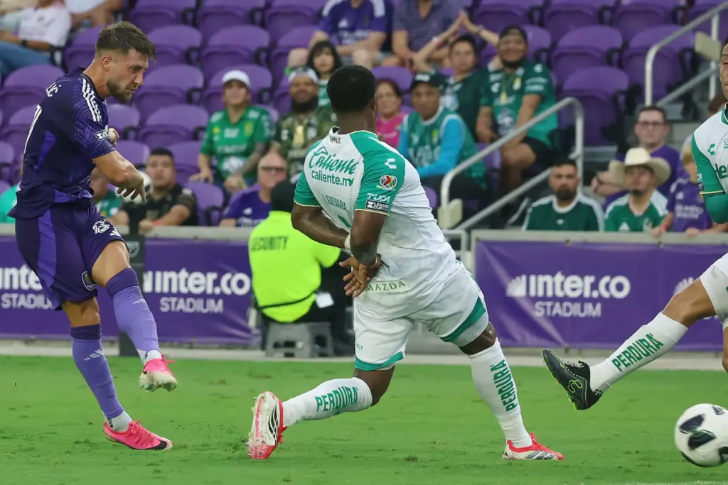 Orlando player Marco Pasalic (left) scores a goal during the...