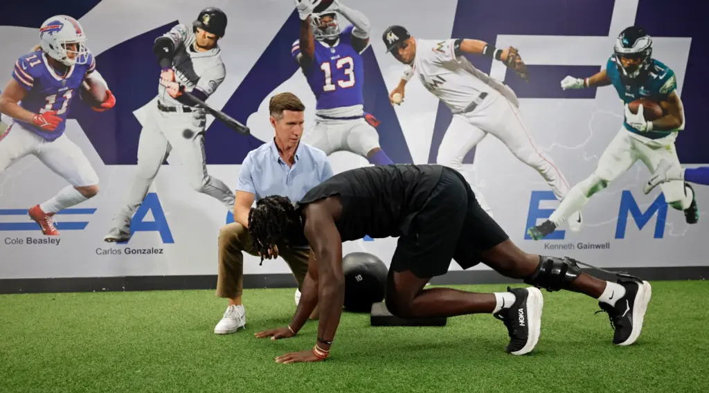 Former FSU linebacker Ethan Pritchard works out with physical therapist...