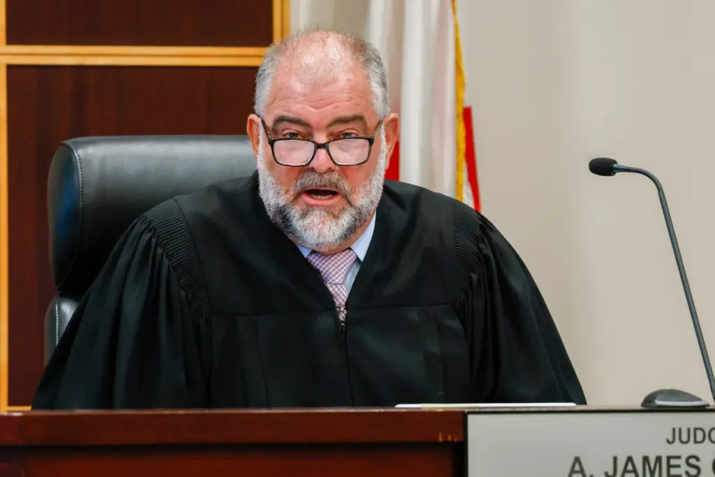 Circuit Judge A. James Craner oversees the bond hearing for...