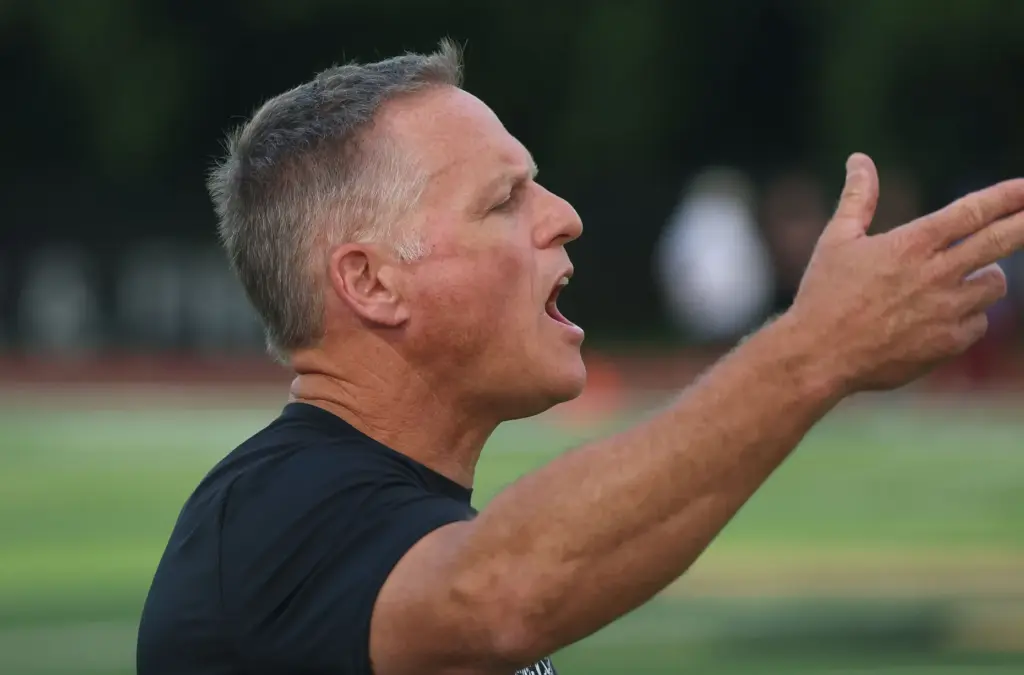 Bishop Moore head coach Matt Hedrick yells during the Lake...