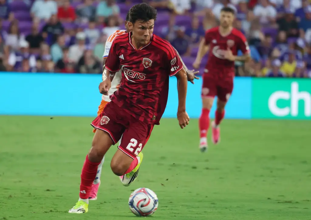 Orlando player Justin Ellis moves the ball during the FC...