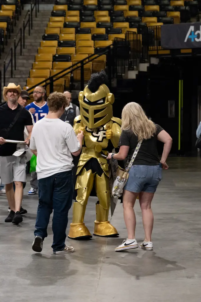 Knightro dances with a fan during UCFâs Annual FanFest at...