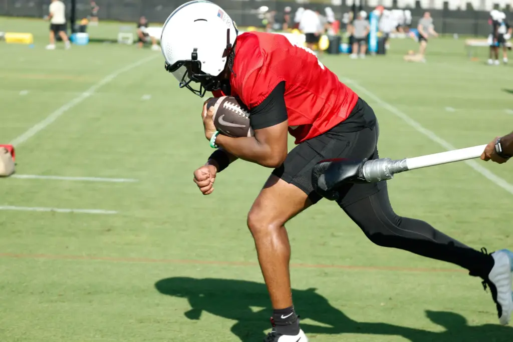 UCF Knights quarterback Alonza Barnett III (#14) runs through drills...