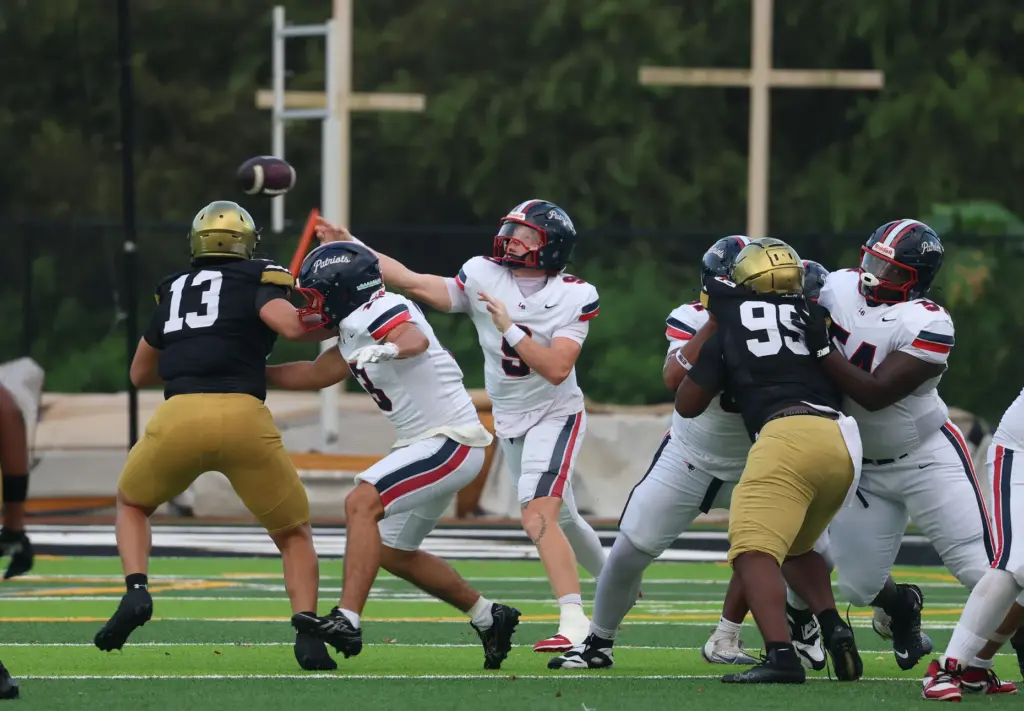 Lake Brantley quarterback Jackson Stecher (9) throws during the Lake...
