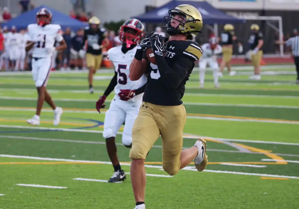Bishop Moore wide receiver Magnus Talma hauls in a touchdown...