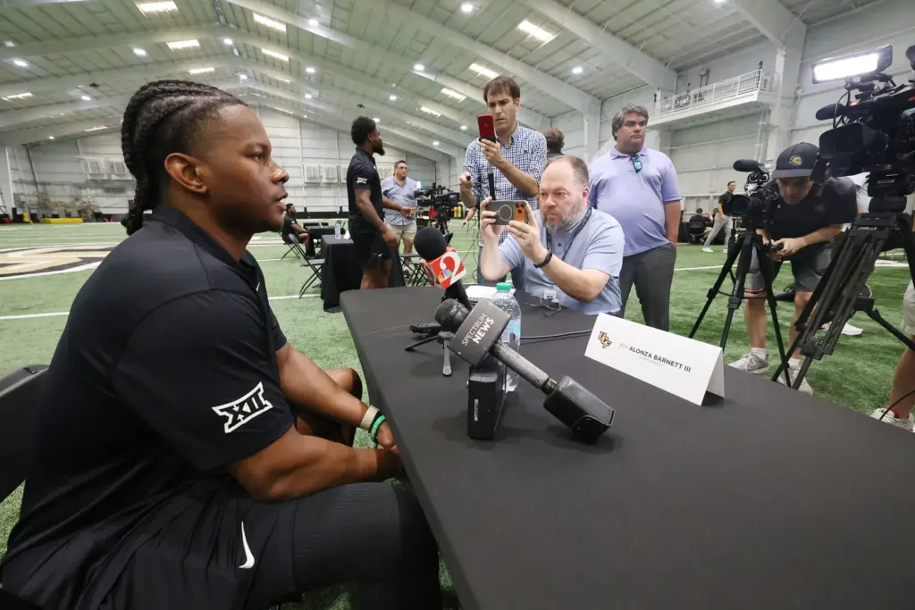 UCF quarterback Alonza Barnett III is interviewed during UCF Football...