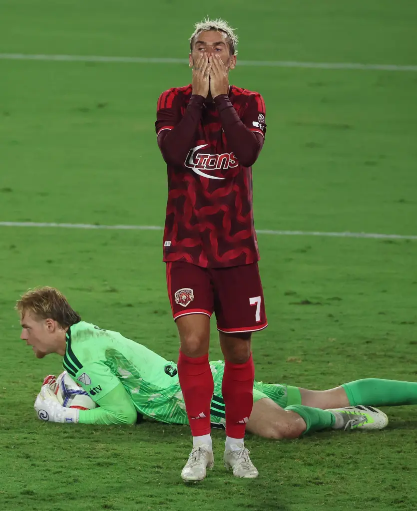 Orlando player Antoine Griezmann (7) is disappointed after missing a...