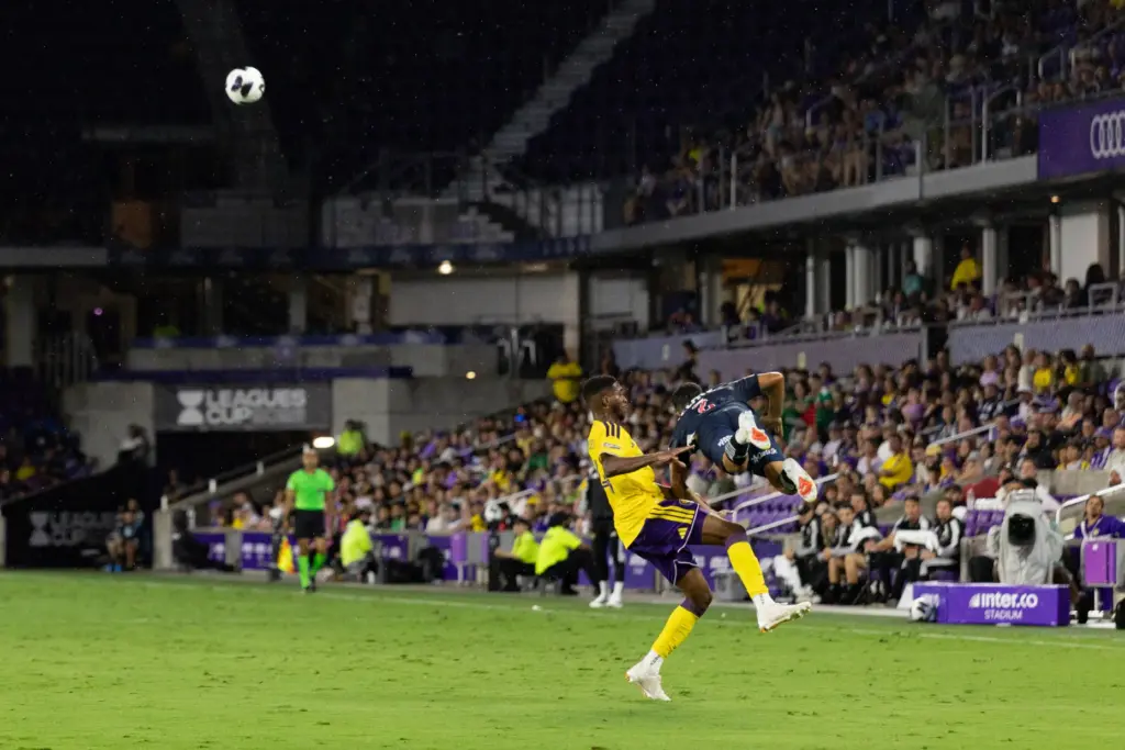 Orlando City player Tyrese Spicer (14) and Monterrey player Ricardo...