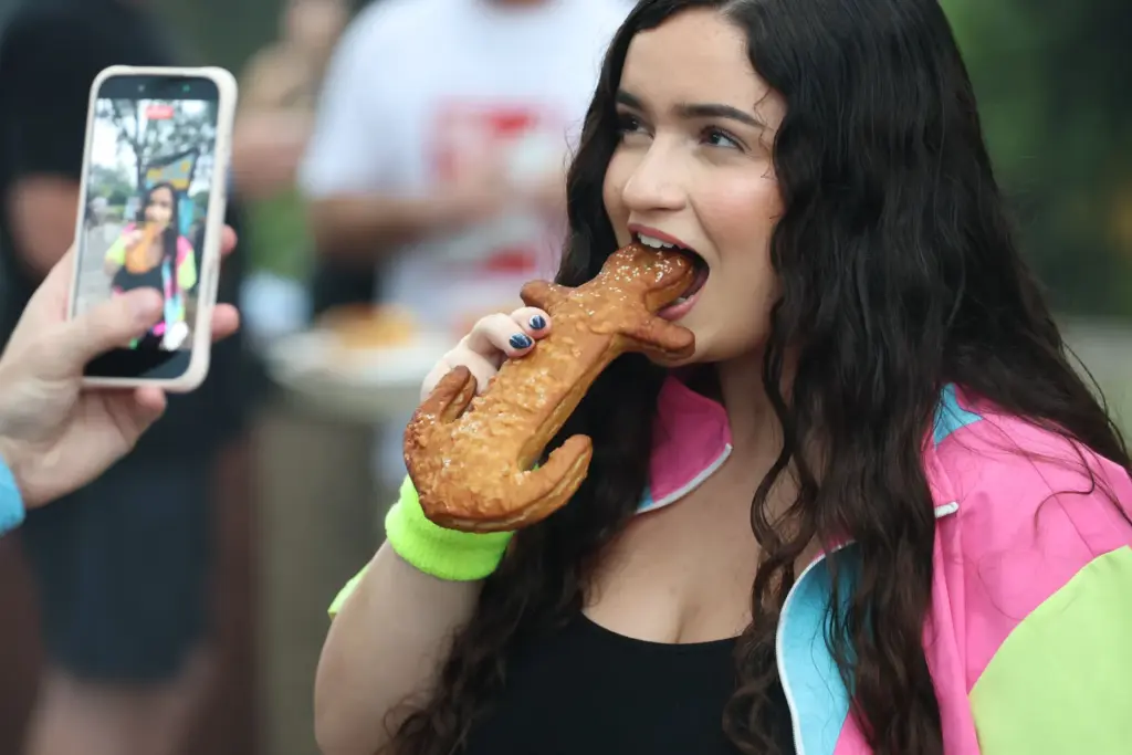 A pretzel moment is photographed during Scream & Sweat, an...