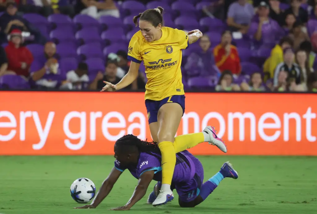 Utah player Tatumn Milazzo (2) fouls Orlando player Barbra Banda...
