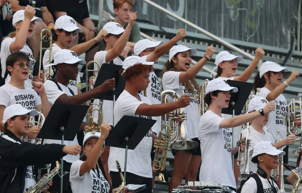 The Bishop Moore band cheers during the Lake Brantley High...