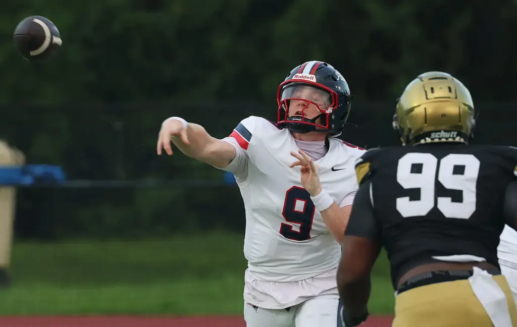 Lake Brantley quarterback Jackson Stecher (9) throws past Bishop Moore...