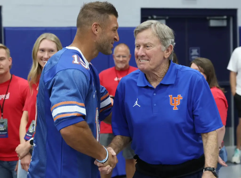 Former University of Florida Heisman Trophy winning quarterbacks Tim Tebow...