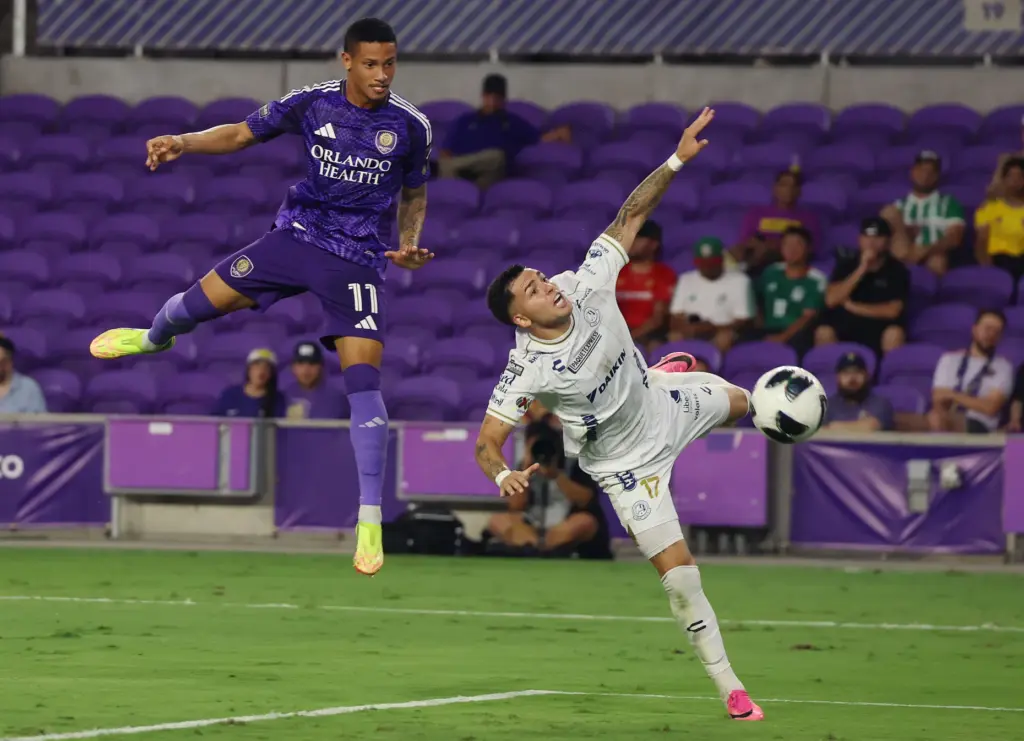Orlando player Tiago (11) and Atletico player Duarte Anderson (17)...
