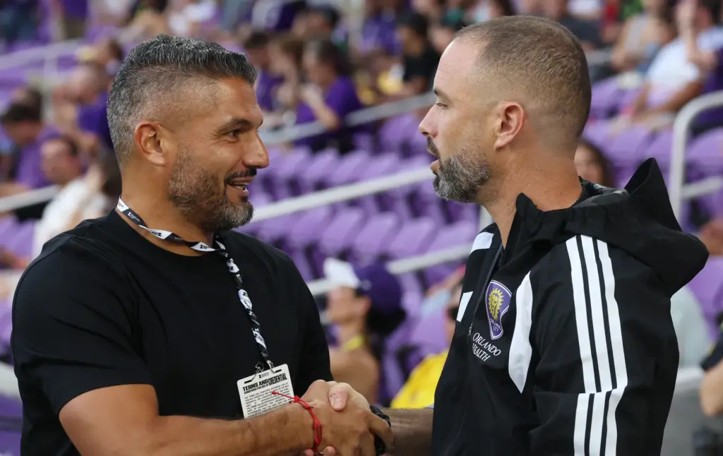 Club Leon head coach Javier Gandolfi, left, and Orlando City...