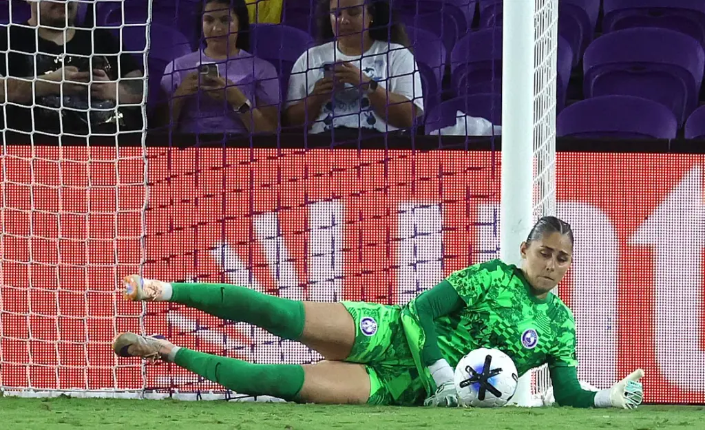 Orlando goalkeeper Cosette Morche makes a save during the Utah...