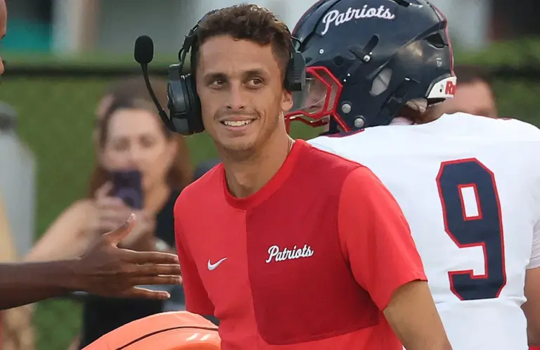Lake Brantley coach Garrett Kruczek smiles during the Lake Brantley...