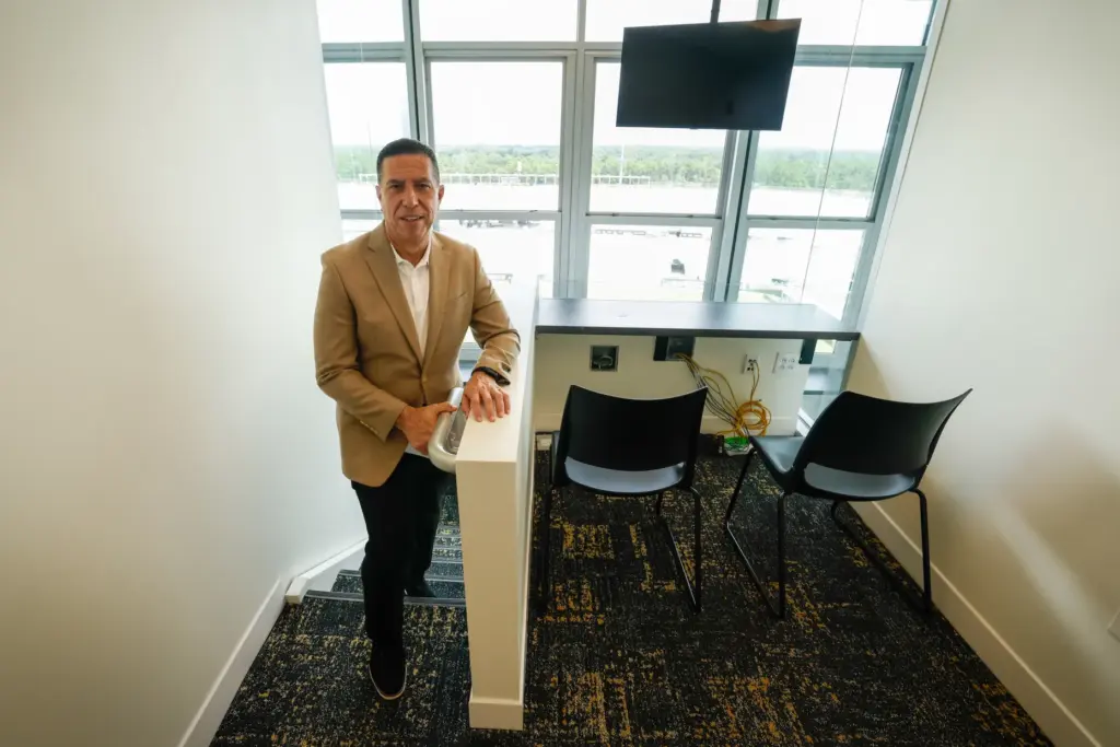 Marc Daniels, play-by-play announcer for UCF football, stands in the...