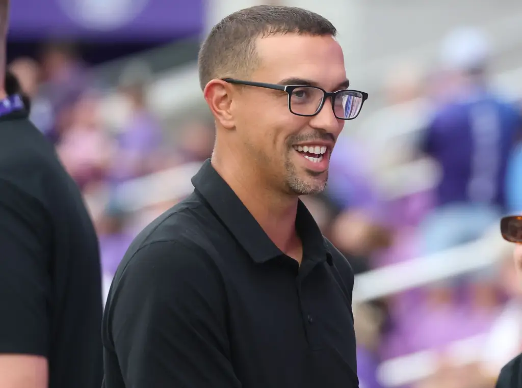 Orlando coach Seb Hines smiles before the Racing Louisville FC...