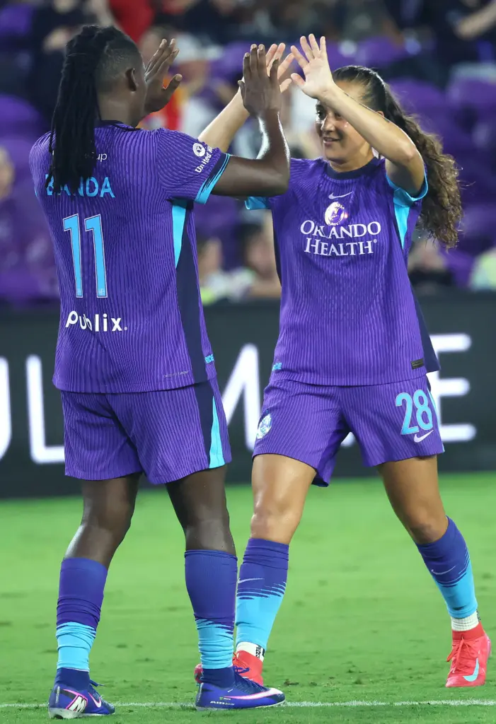 Orlando player Barbra Banda (11) celebrates with teammate Summer Yates...