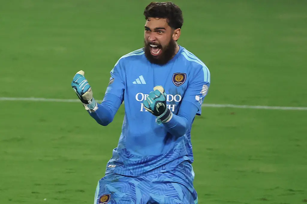 Orlando goalkeeper Javier Otero (12) screams in celebration after blocking...