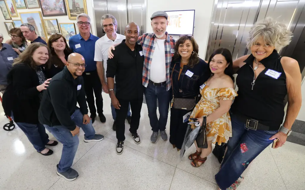 Former and current Orlando Sentinel journalists and employees are pictured...