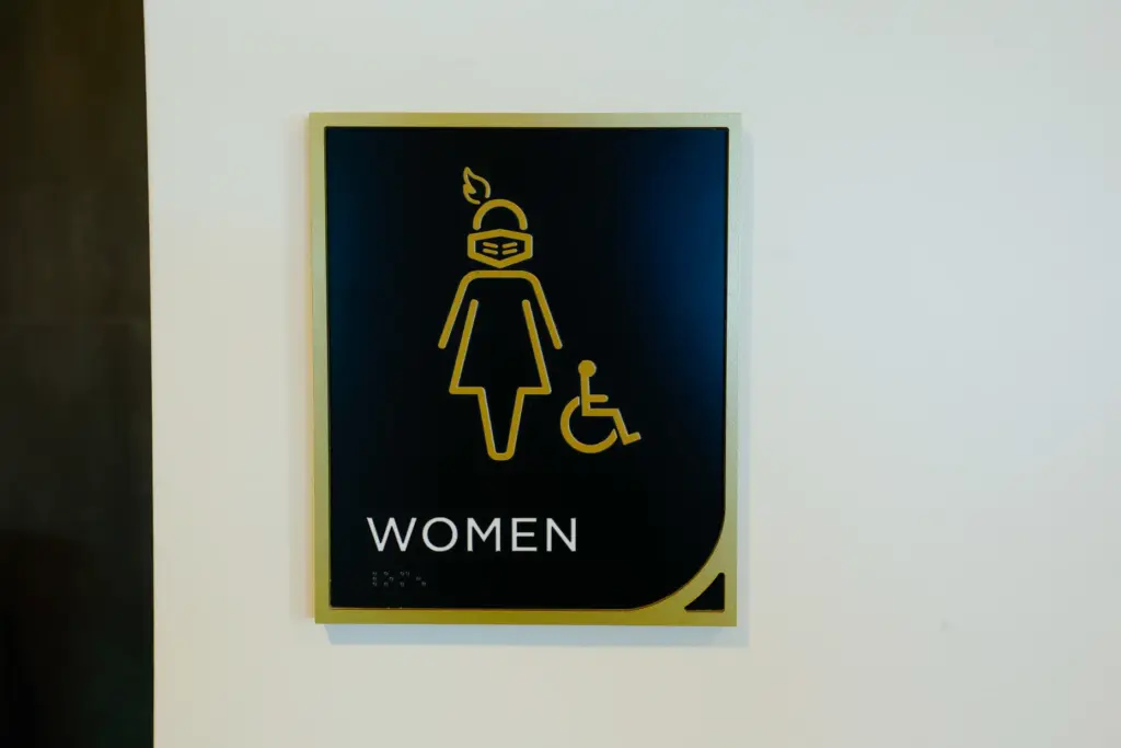 A knight-themed detail for the restroom signage at the Roth...