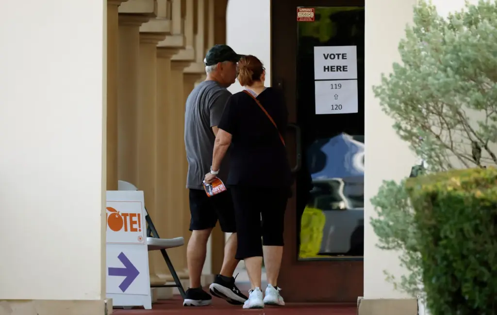 Voters enter Precincts 119 & 120 at the Quay Church...