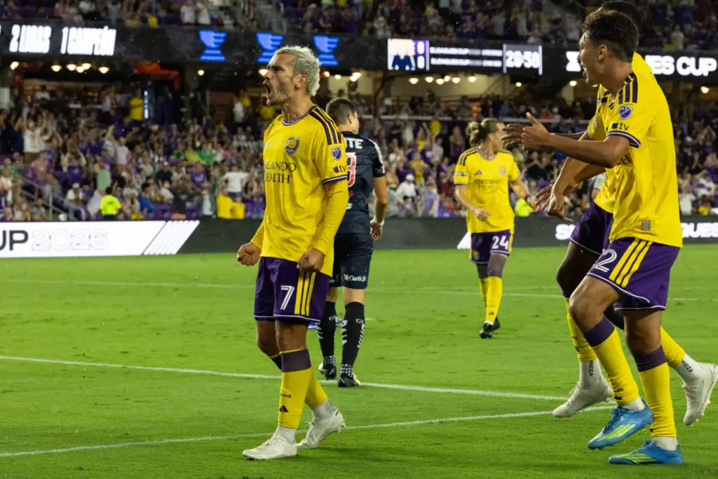 Orlando City player Antoine Griezmann (7) screams in celebration after...