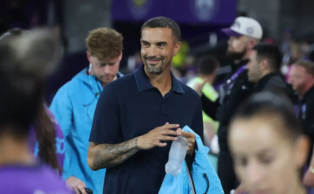 Orlando coach Seb Hines smiles before the Utah Royals at...