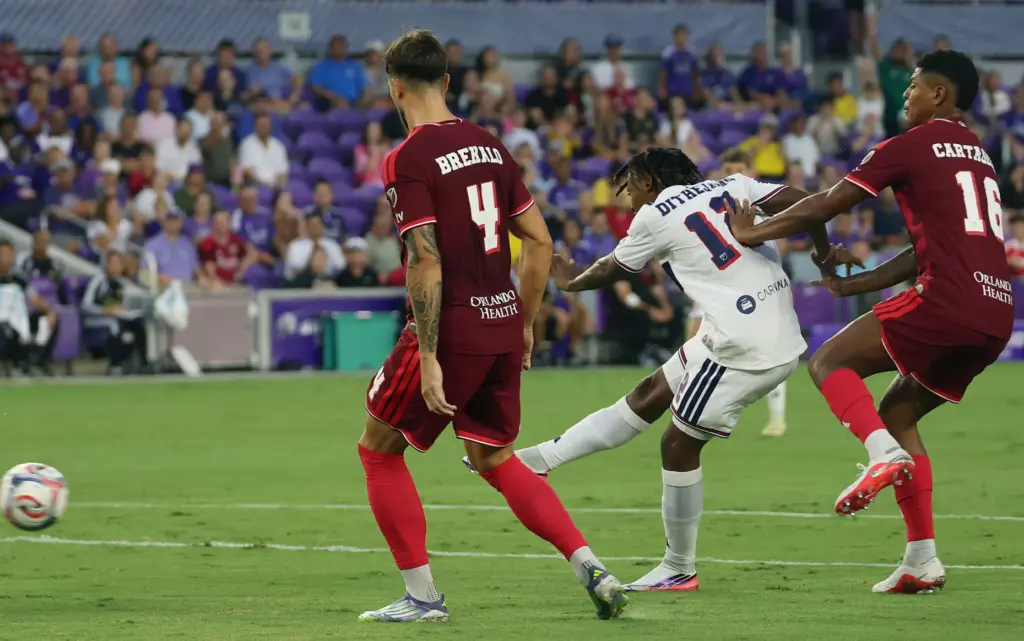 Chicago player Puso Dithejane (12) scores a goal past Orlando...