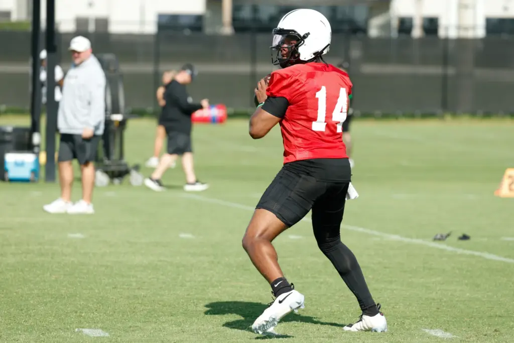UCF Knights quarterback Alonza Barnett III (#14) runs through drills...