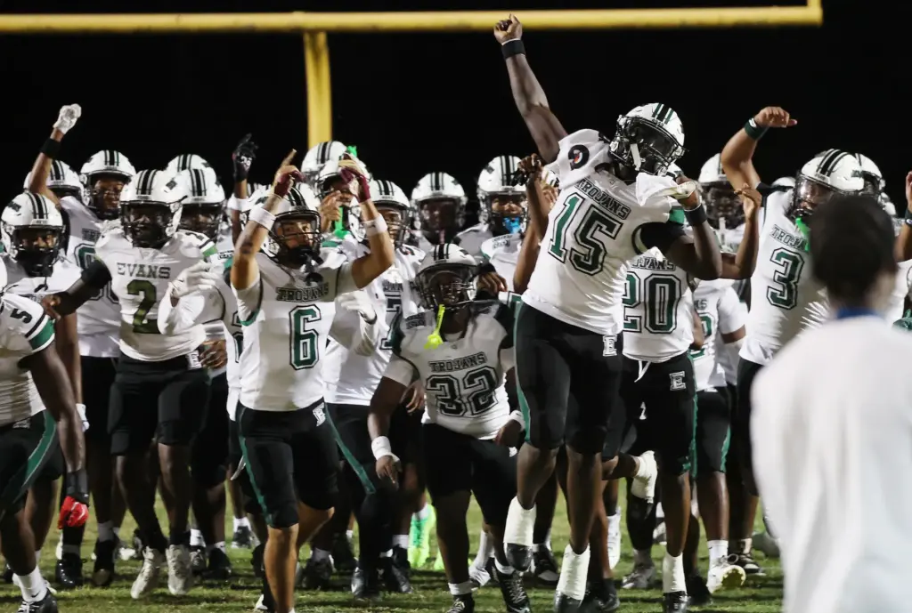 Evans players are pictured before the Evans High at Lake...