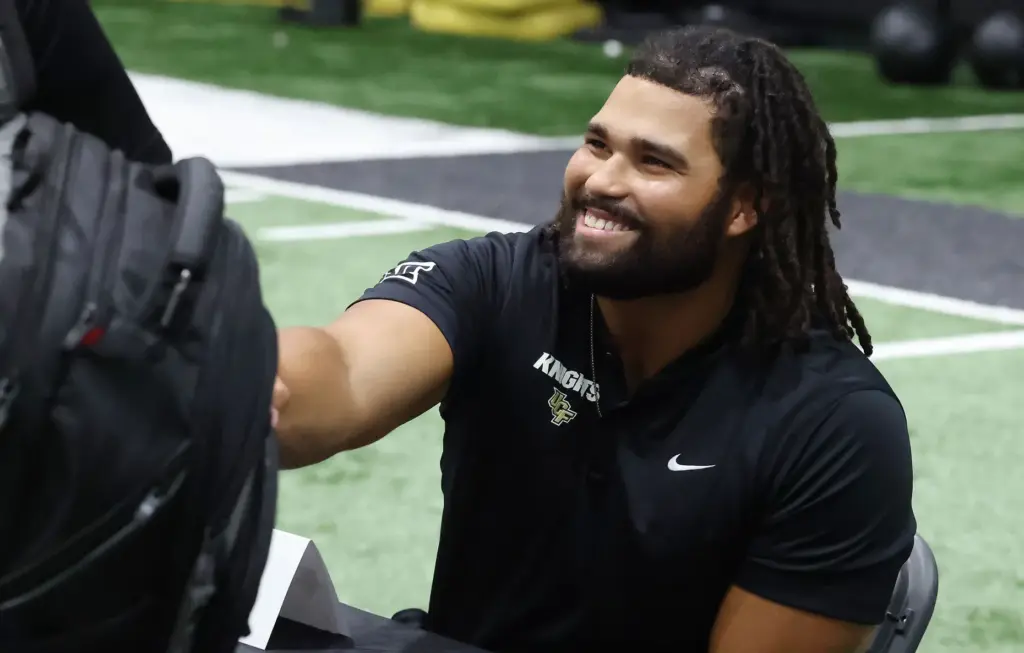UCF defensive tackle Thomas Collins is interviewed during UCF Football...