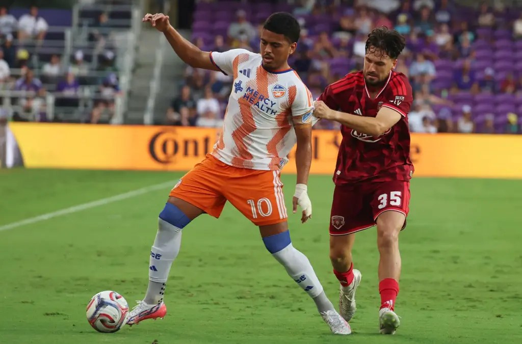 Orlando player Joran Gerbet (35) tries to stop Cincinnati player...