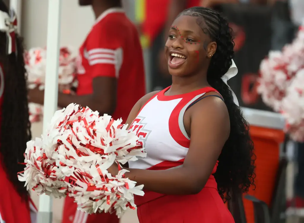 Edgewater cheerleaders cheer during the The First Academy at Edgewater...