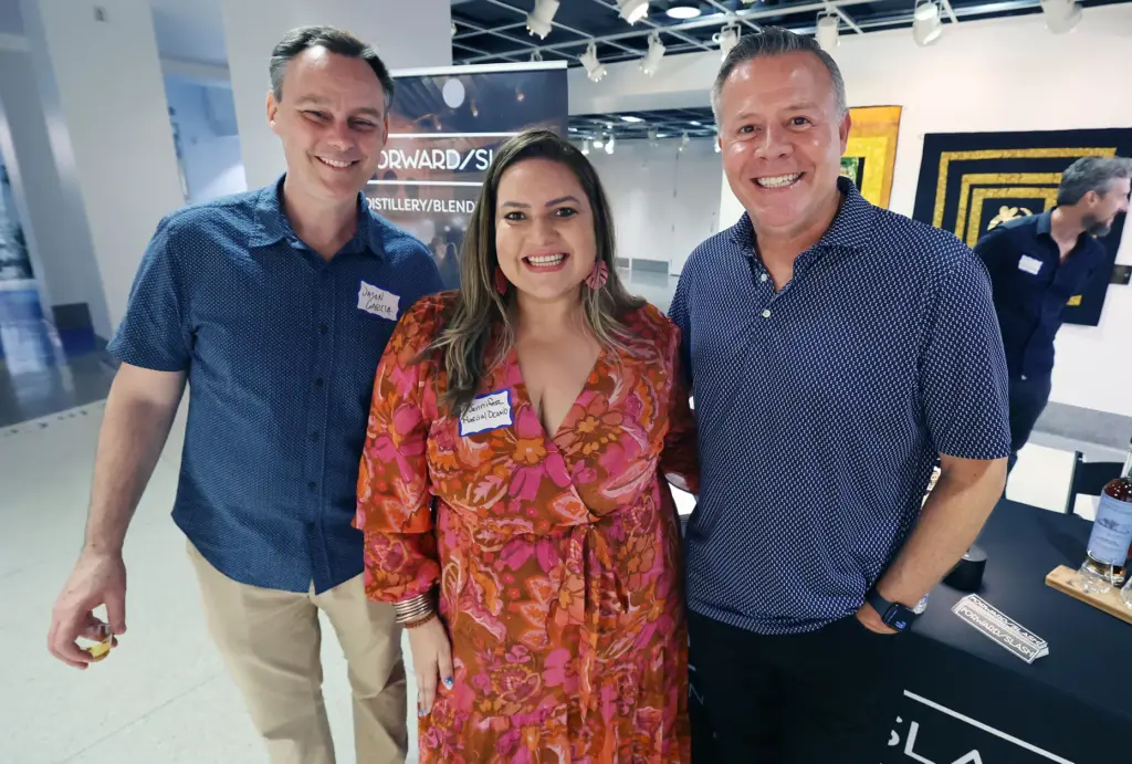 Former and current Orlando Sentinel journalists and employees are pictured...