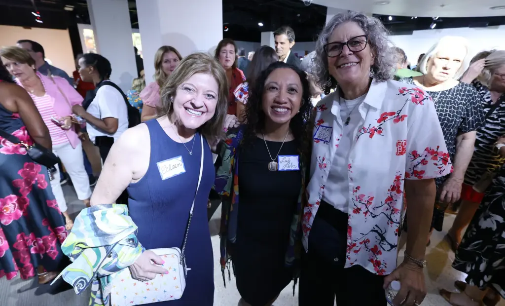 Former and current Orlando Sentinel journalists and employees are pictured...