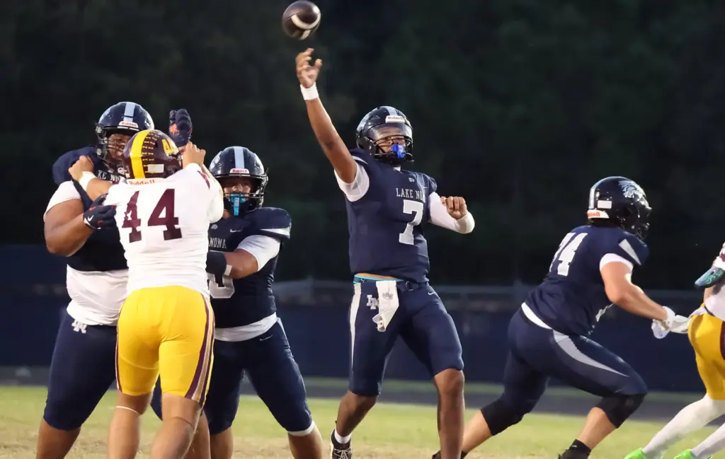 Lake Nona quarterback Elijah Nickerson (7) throws during the St....
