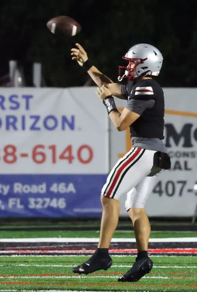 Lake Mary quarterback Remy Jarman throws during the Osceola High...