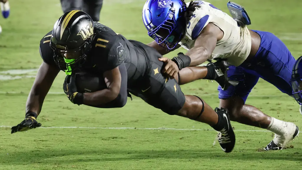 UCF running back Landen Chambers (11) dives during the Georgia...
