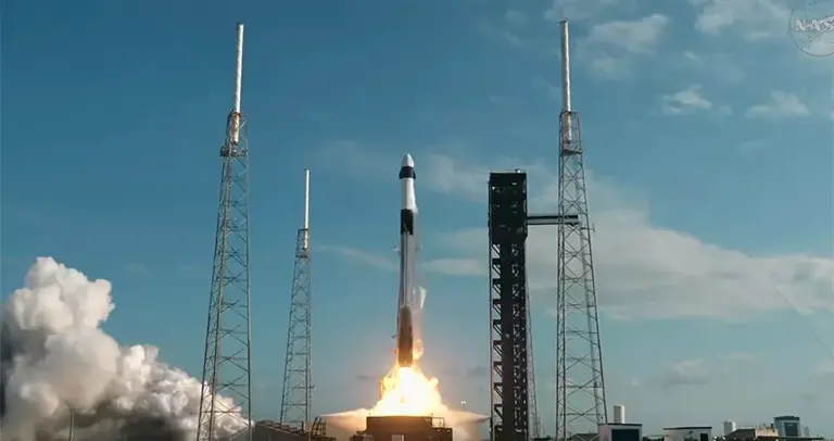 A SpaceX Falcon 9 topped with a cargo Dragon spacecraft...