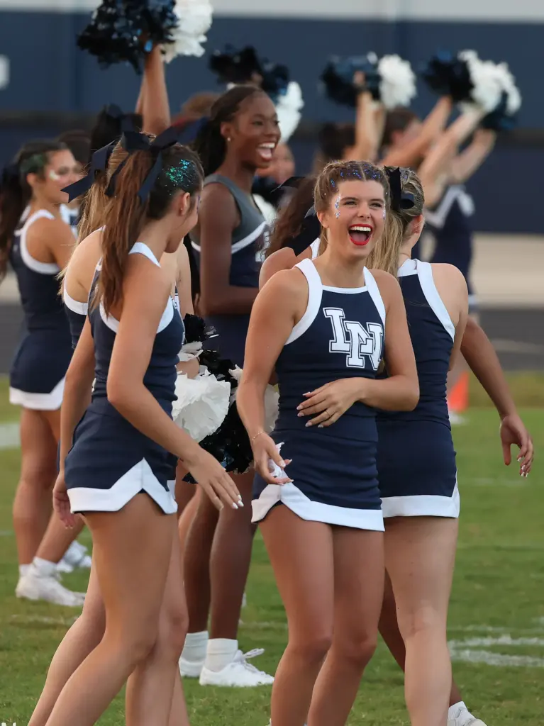 Cheerleaders cheer during the St. Cloud High at Lake Nona...
