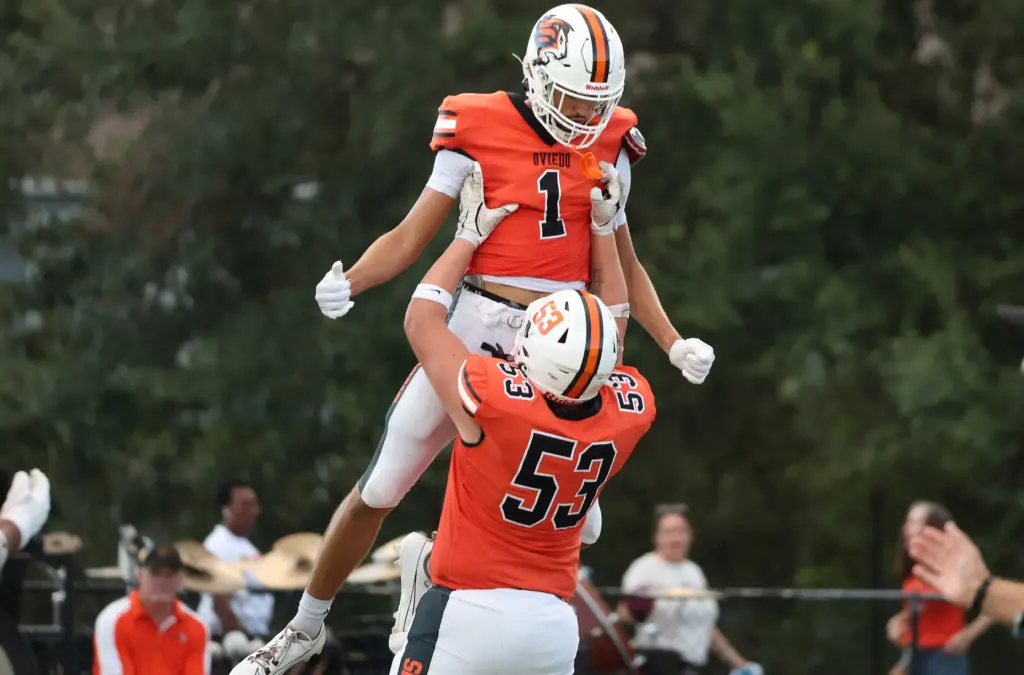 Oviedo receiver Jordan Donahoo (1) celebrates after a touchdown during...