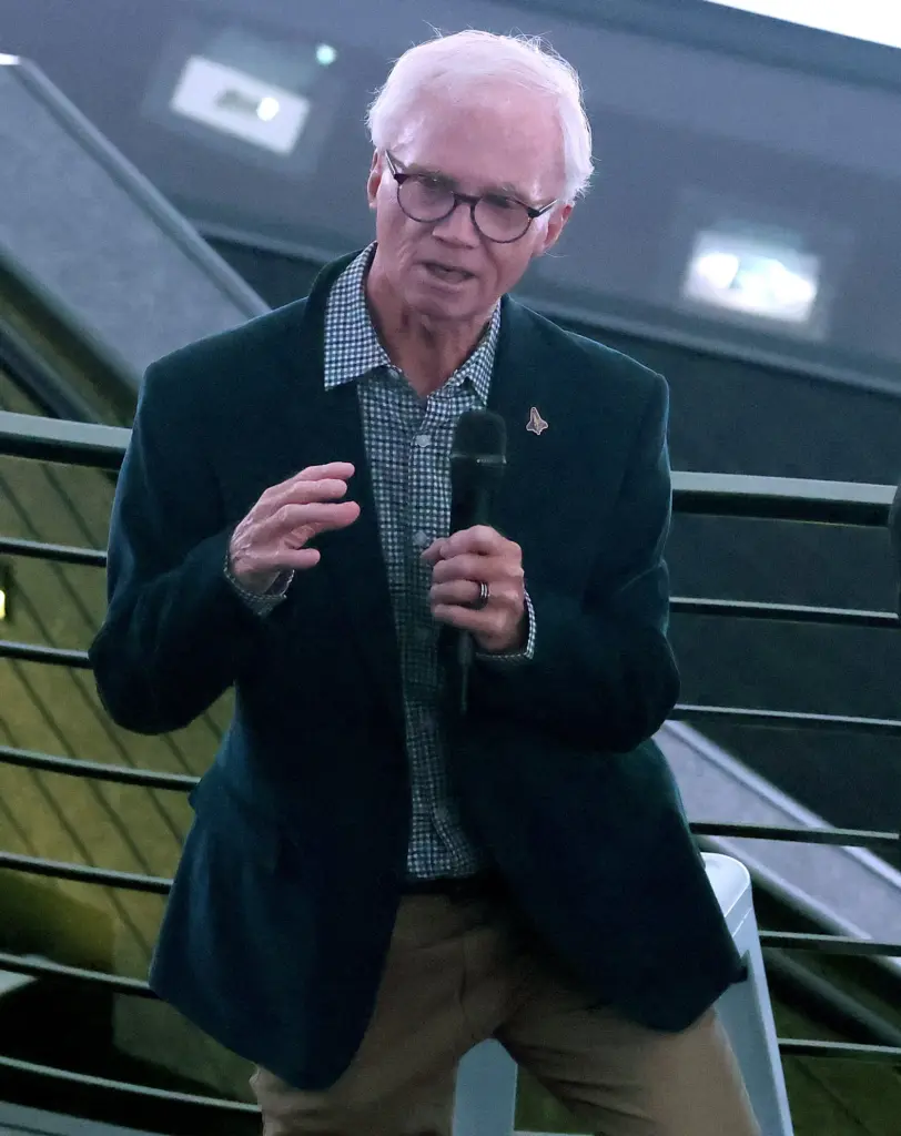 Former Orlando Sentinel photographer Red Huber speaks during the Orlando...