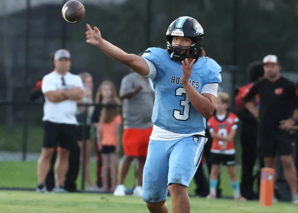 Hagerty quarterback Royce Jenkins (3) throws during the Oviedo High...