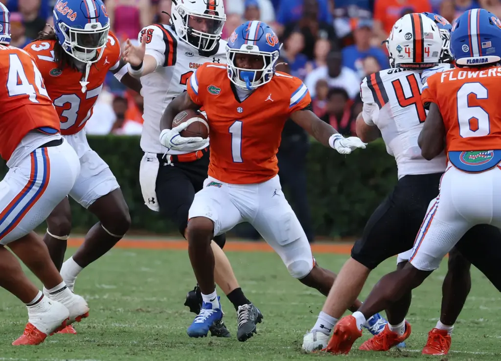 Florida receiver Vernell Brown III (1) runs after a catch...