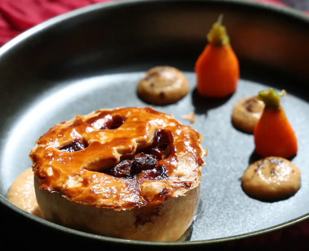 14th HOOLEY AT DISNEY â A puff-pastry pie filled with...